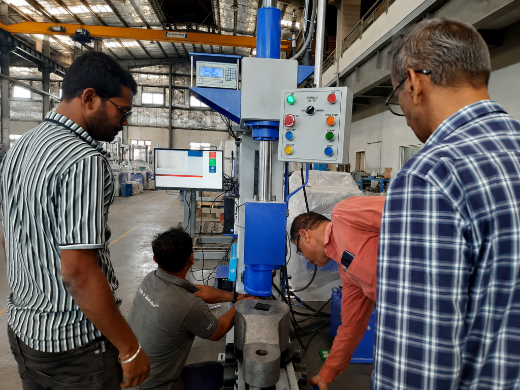fsa testwin engineers pre dispatch inspection indian railways FSA and TESTWIN engineers conducting a pre-dispatch inspection of a material testing machine at the FSA manufacturing facility before delivery to an Indian Railways project.