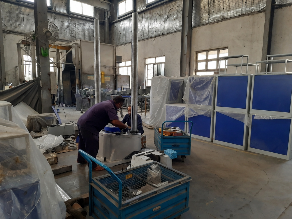 universal testing machine assembly initial stage fsa factory testwin 1200x900 Engineers assembling a Universal Testing Machine (UTM) in the initial manufacturing stage at the FSA factory.
